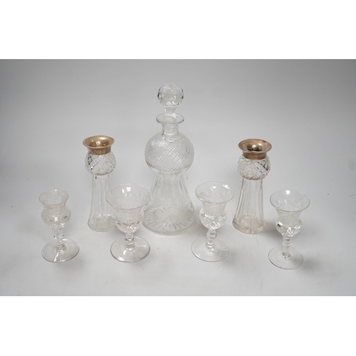 1397 - A late Victorian engraved thistle shaped liqueur decanter, 4 glasses and a pair of silver mounted ja... 