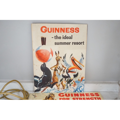 1402 - Five Guinness advertising signs, mirror,  trays and a book - St. Jamess Gate Brewery History and Gu... 