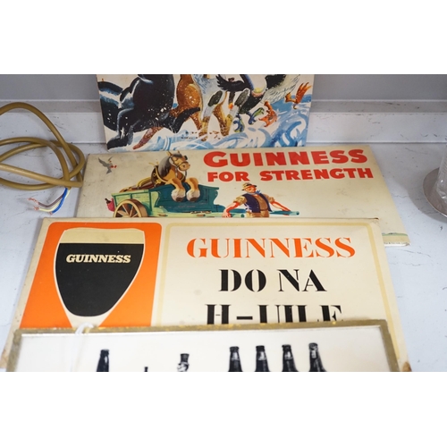 1402 - Five Guinness advertising signs, mirror,  trays and a book - St. Jamess Gate Brewery History and Gu... 