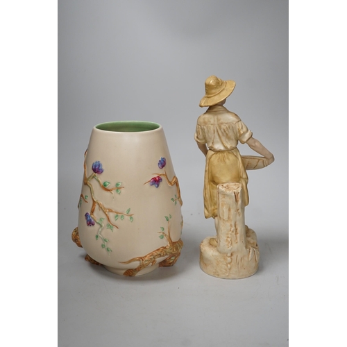 1415 - A Royal Dux figure of a water carrier and a Clarice Cliff for Newport Pottery vase. Tallest 27cm... 