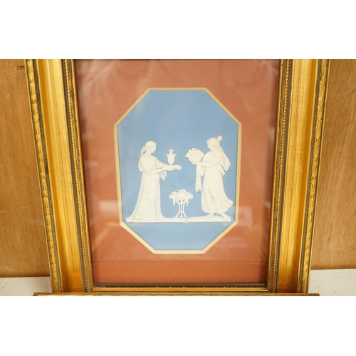 1423 - Three framed Wedgwood Jasper ware plaques (one cracked),largest 14.5cms high