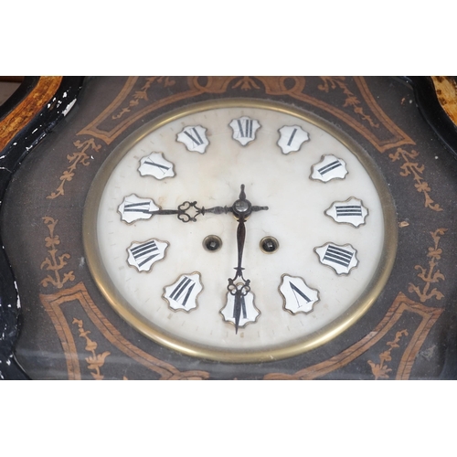 1430 - A  late 19th century oval French marquetry wall clock with enamel Roman numerals, 62cms high