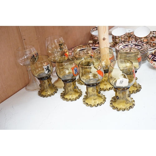 1433 - A set of six German enamelled green hock glasses, another larger hock glass and a pair of similar cl... 