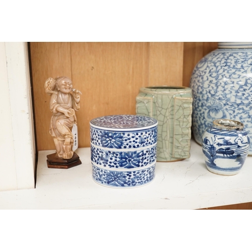 1445 - A group of 19th century blue and white jars, a stacking food box and two bowls, together with a cela... 