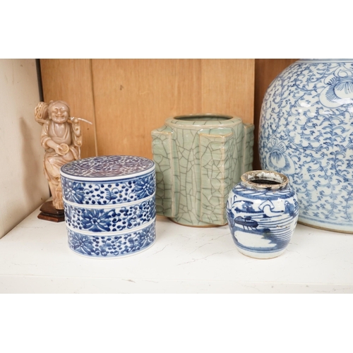 1445 - A group of 19th century blue and white jars, a stacking food box and two bowls, together with a cela... 