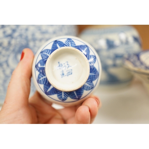 1445 - A group of 19th century blue and white jars, a stacking food box and two bowls, together with a cela... 