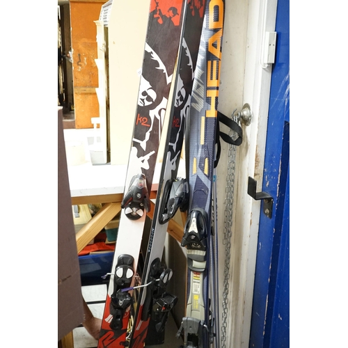 1467 - A pair of K2 skis, a pair of Head intelligence skis and a pair of Lexi ski poles