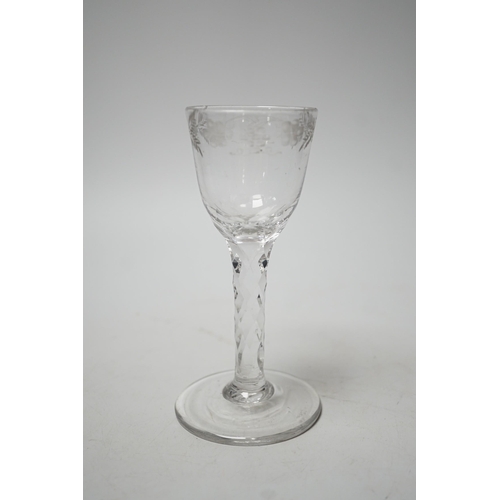 1496 - A George III facet stem wine glass. 15.5cm tall