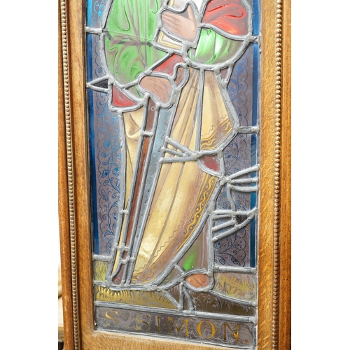 1497 - A pair of Victorian framed stained glass panels of St. Martin and St. Simon. 68.5cm tall