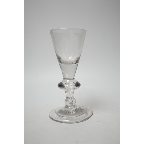 1499 - A George I heavy baluster wine glass, round funnel bowl above angular knop with air-tear, circa 1715... 