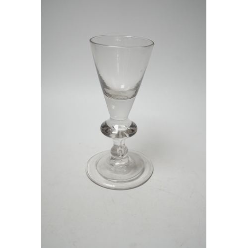 1499 - A George I heavy baluster wine glass, round funnel bowl above angular knop with air-tear, circa 1715... 