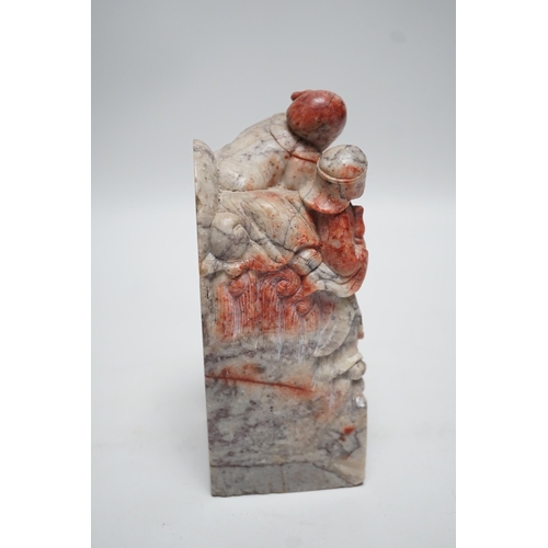 1501 - A large Chinese chicken blood soapstone seal, Qing dynasty. 15cm