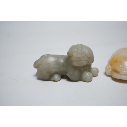 1548 - A Chinese white and russet Jade chilong carving and a celadon jade figure of a lion-dog,  7cm