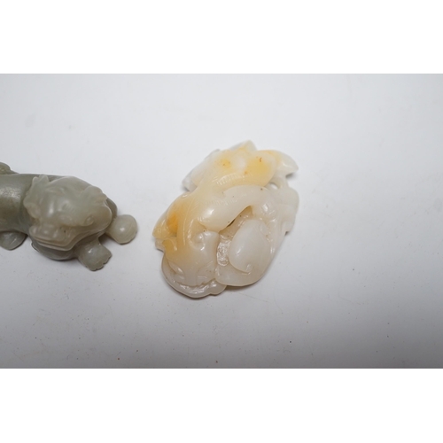 1548 - A Chinese white and russet Jade chilong carving and a celadon jade figure of a lion-dog,  7cm