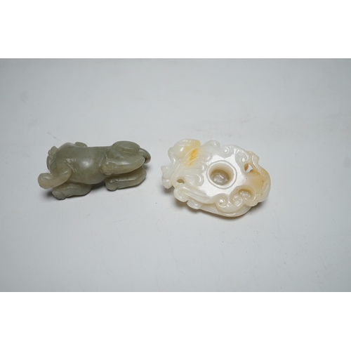 1548 - A Chinese white and russet Jade chilong carving and a celadon jade figure of a lion-dog,  7cm