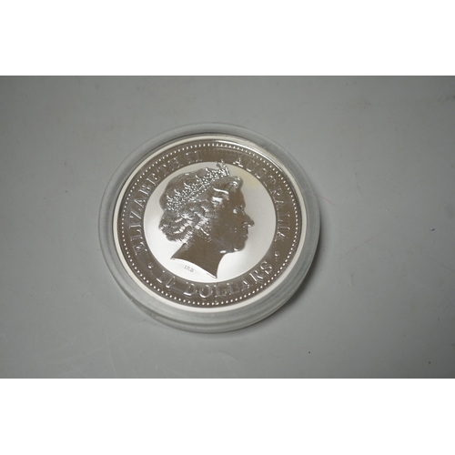 1576 - A group of boxed collector's coins; CPM RAF Centenary silver proof three coin setCPM Platinum Weddin... 