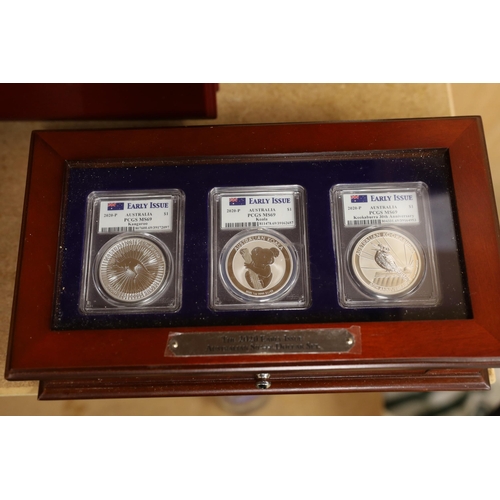 1577 - A group of incomplete boxed collector's coin sets; PCS Benjamin Franklin US Half Dollar Collection; ... 