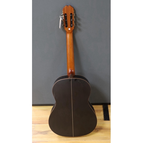 1587 - An Admira 'Concerto' classical guitar. Cedar top, satin finish with rosewood back and sides