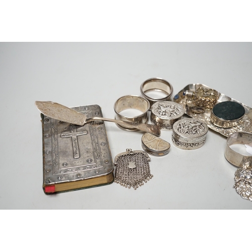 1807 - Sundry small silver including four assorted napkin rings, mounted bible, butter knife, pin tray, win... 