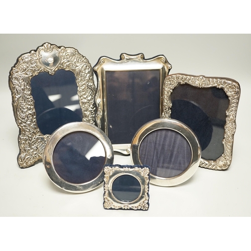 1822 - Six assorted modern silver mounted photograph frames, largest 21cm.