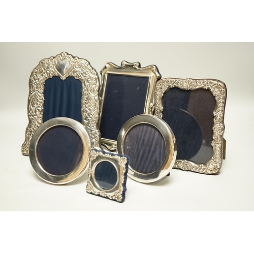 1822 - Six assorted modern silver mounted photograph frames, largest 21cm.