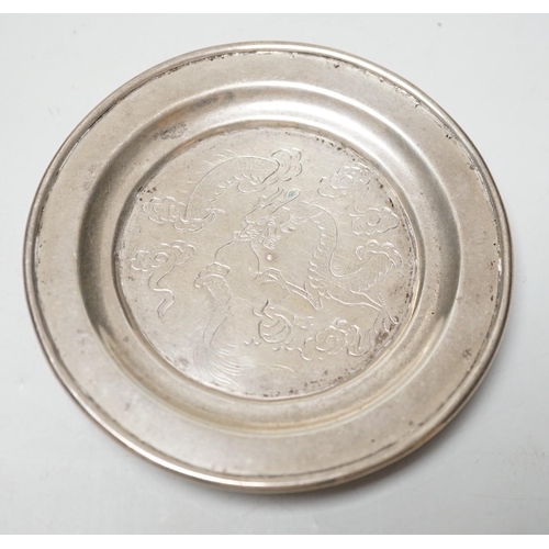 1824 - A Chinese white metal small dish, engraved with dragon, diameter 11.3cm, 121 grams.