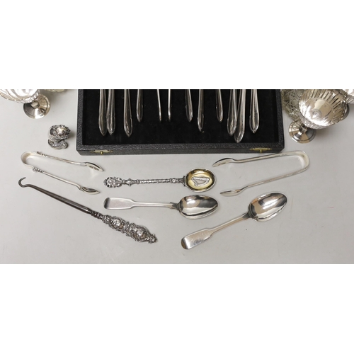 1847 - Sundry small silverwares including flatware, a pair of mounted glass scent bottles, a white metal Ge... 