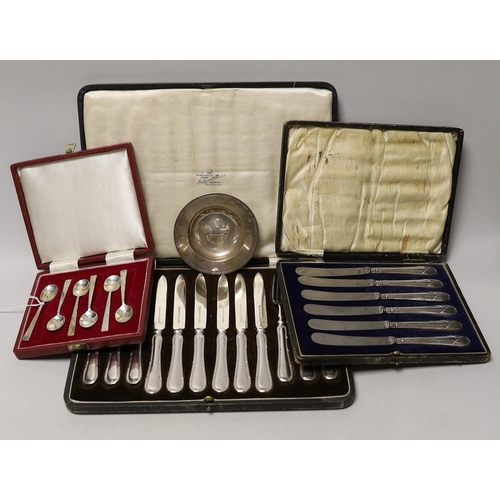 1848 - A cased set of six silver coffee spoons, a cased set of six silver-handled dessert knives, a small s... 