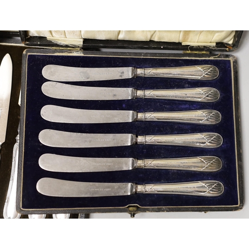 1848 - A cased set of six silver coffee spoons, a cased set of six silver-handled dessert knives, a small s... 