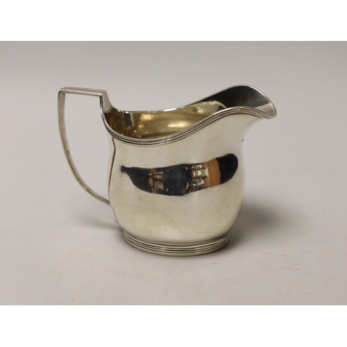 1851 - A George III silver helmet shaped cream jug, London, 1810, 10cm, 5.8oz.