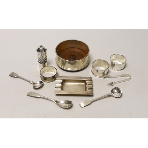 1853 - A silver coaster, ashtray, two napkin rings, cutlery etc.