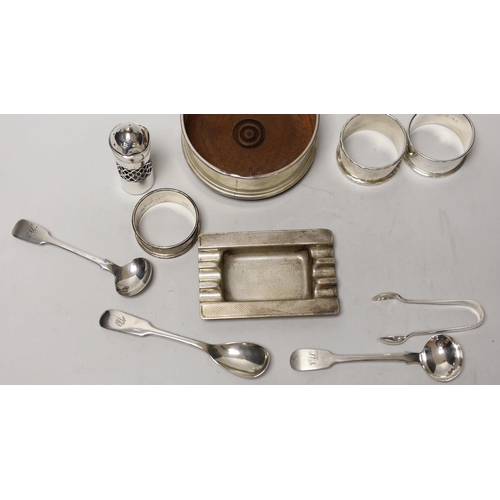 1853 - A silver coaster, ashtray, two napkin rings, cutlery etc.