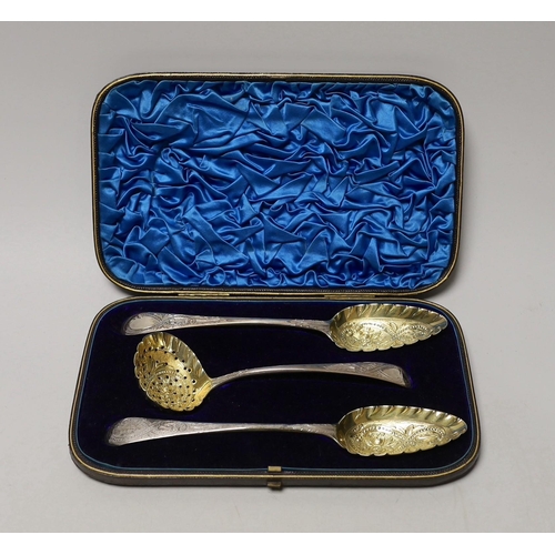 1854 - A cased set of two George III parcel gilt silver spoons and a matching sifter spoon, George Burrows,... 