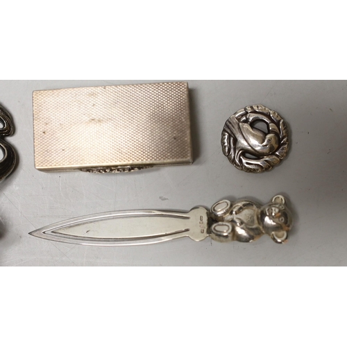 1862 - An Art Nouveau metal mounted cork stopper, a  Georg Jensen sterling brooch, no. 191, an  engine turn... 