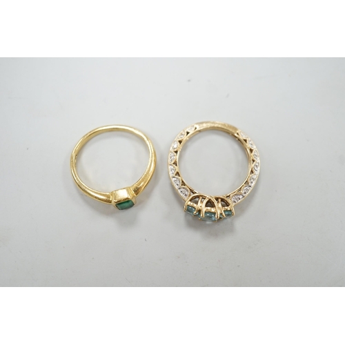 1878 - A modern 18ct gold and single stone emerald set ring, size M, gross weight 4 grams and a modern 14k ... 