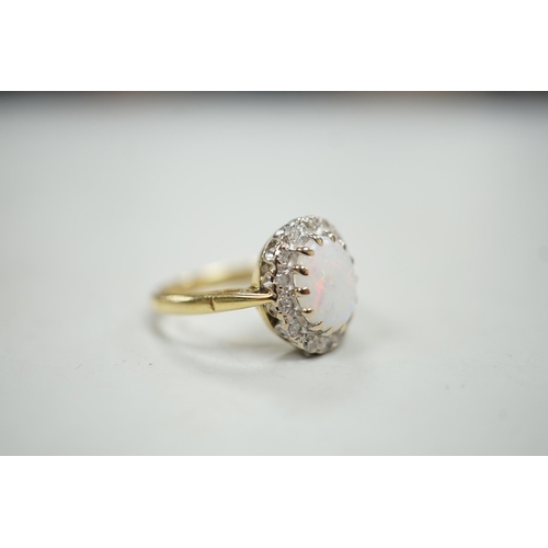 1883 - A modern 18ct white gold white opal and diamond set oval cluster ring, size M, gross weight 4.3 gram... 