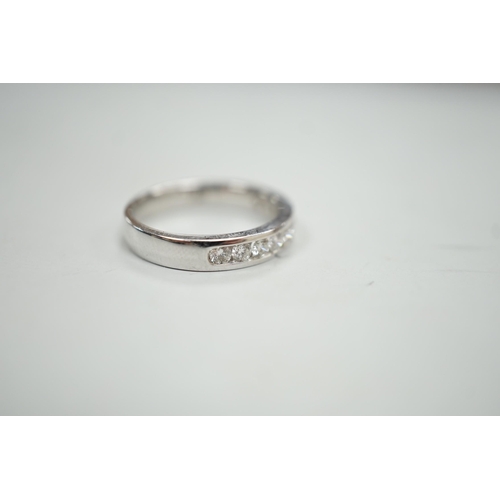 1884 - A modern 18k white metal and ten stone channel set diamond half eternity ring, size L/M, gross weigh... 