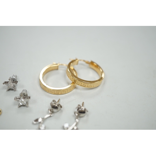 1885 - A modern pair of 18ct white gold and diamond cluster set star ear studs, 8mm, gross weight 1.1 grams... 