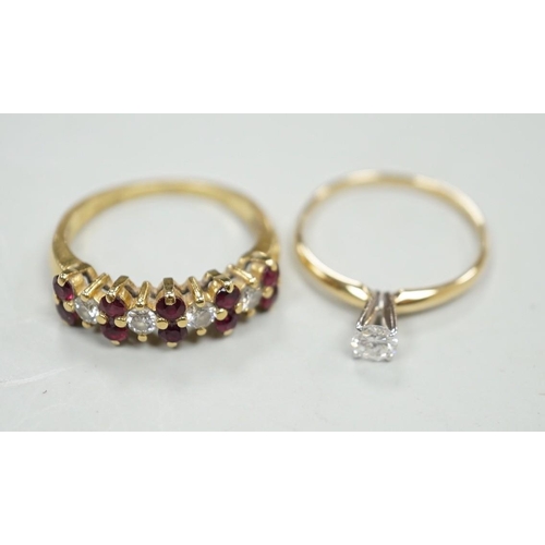 1887 - A modern 18ct gold, ruby and diamond cluster set half hoop ring, size L, gross weight 3.4 grams and ... 