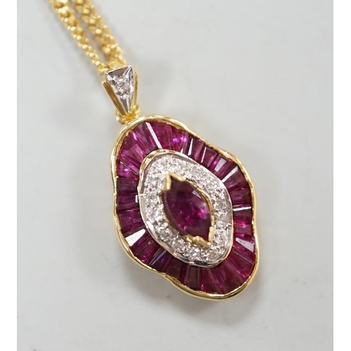 1888 - A modern 18k yellow metal, ruby and diamond cluster set quatrefoil shaped pendant, overall 25mm, on ... 