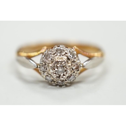 1899 - An 18ct and diamond cluster set ring, size K, gross weight 2.4 grams.