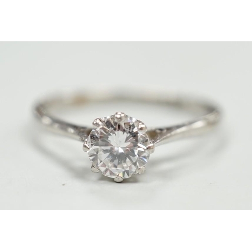 1901 - A white metal (stamped plat) and solitaire diamond ring, size P, gross weight 2.9 grams, the stone w... 