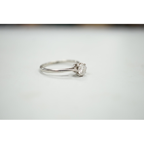 1901 - A white metal (stamped plat) and solitaire diamond ring, size P, gross weight 2.9 grams, the stone w... 