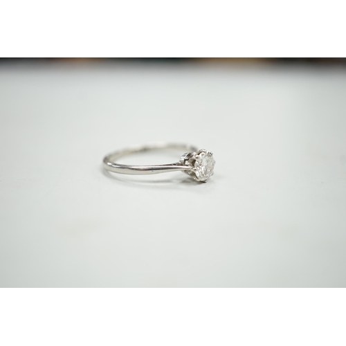 1901 - A white metal (stamped plat) and solitaire diamond ring, size P, gross weight 2.9 grams, the stone w... 