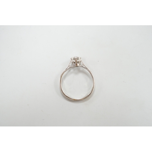 1901 - A white metal (stamped plat) and solitaire diamond ring, size P, gross weight 2.9 grams, the stone w... 