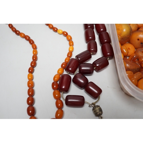 1904 - A single strand graduated amber bead necklace, 54cm gross weight 30 grams, together with loose amber... 