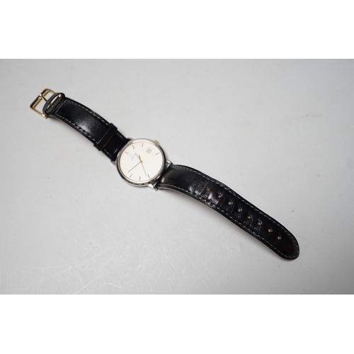 1906 - A gentleman's 1990's stainless steel Omega quartz dress wrist watch, with date aperture, case diamet... 