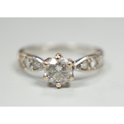 1935 - A modern 18ct gold and single stone diamond ring, with diamond set shoulders, size J, gross weight 2... 