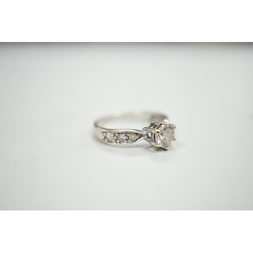 1935 - A modern 18ct gold and single stone diamond ring, with diamond set shoulders, size J, gross weight 2... 