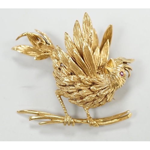 1937 - A 1960's Boucheron of Paris 18ct gold and ruby set brooch, modelled as a bird upon a branch,   signe... 